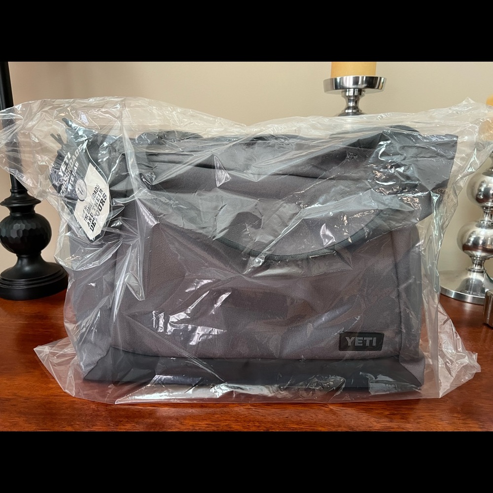 YETI Crossroads Totebag 16. Brand New in unopened bag. Color: Charcoal